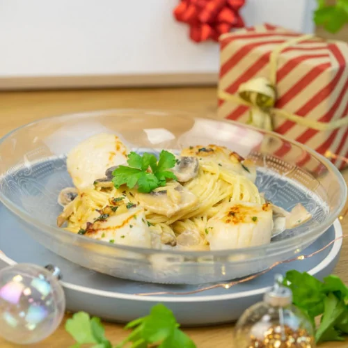 Scallops with parsley butter and capellini with forestry sauce